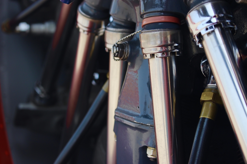 Close-up of industrial pipe flanges in a refinery
